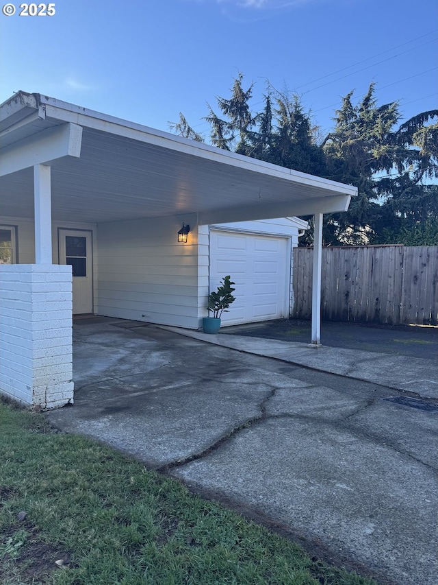 garage featuring a carport