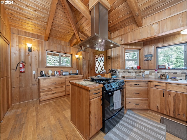 kitchen with wooden ceiling, wooden walls, island range hood, and black range oven