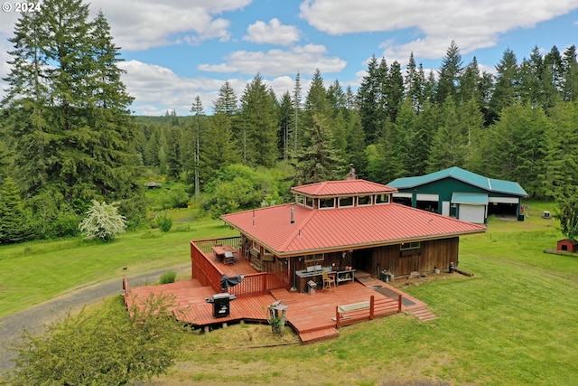 exterior space with a lawn and a wooden deck