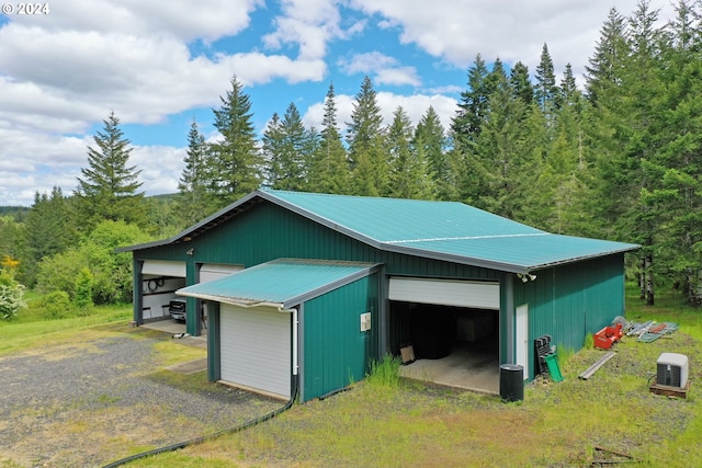 view of outdoor structure with a garage