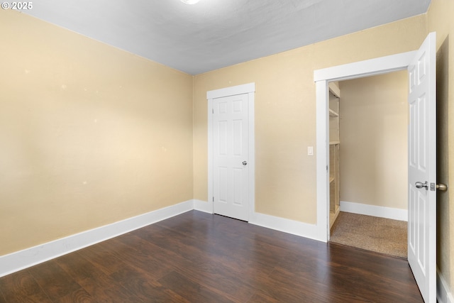 213 Engle Ave, Molalla, OR 97038 - unfurnished bedroom with dark wood-style floors