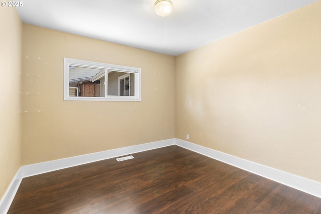 213 Engle Ave, Molalla, OR 97038 - unfurnished room with dark wood-style floors and baseboards