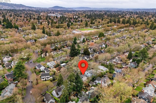 aerial view featuring a residential view and a mountain view