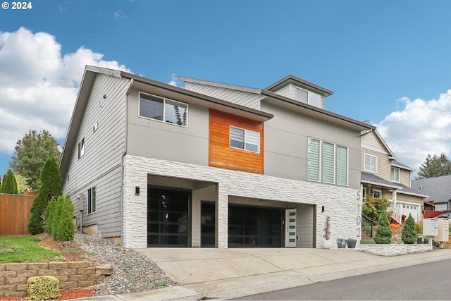 modern home featuring a garage