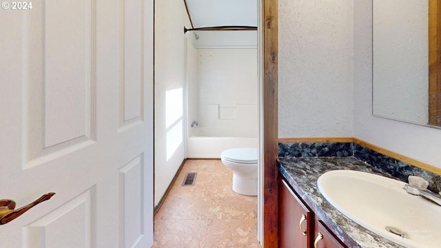 full bathroom featuring tile patterned floors, vanity, shower / bathtub combination, and toilet