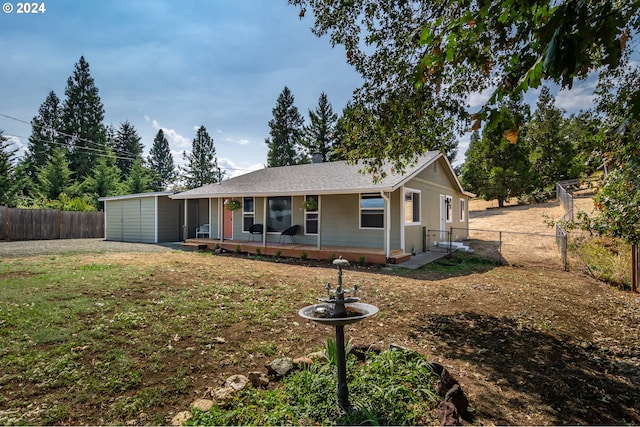 ranch-style house featuring a front lawn