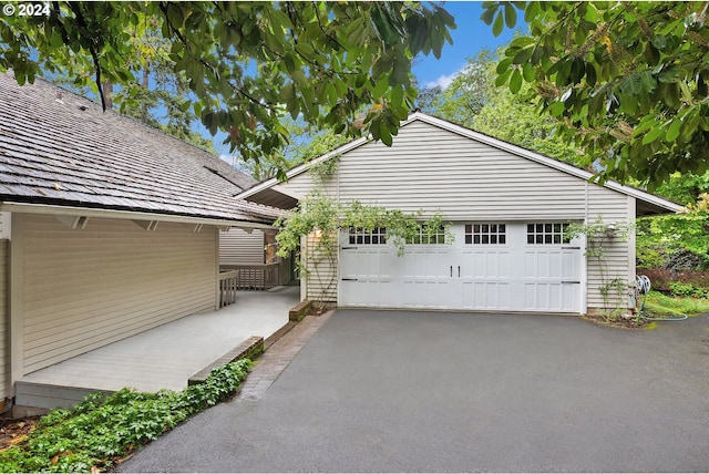 view of home's exterior featuring a garage