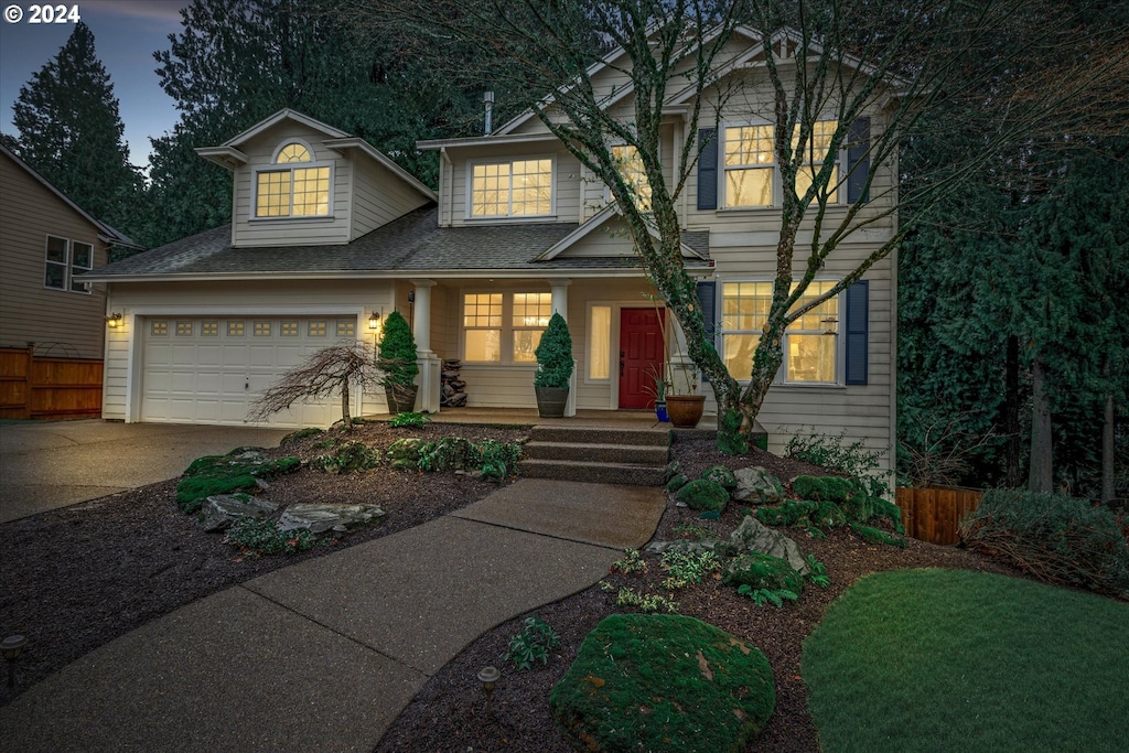 craftsman house with a garage