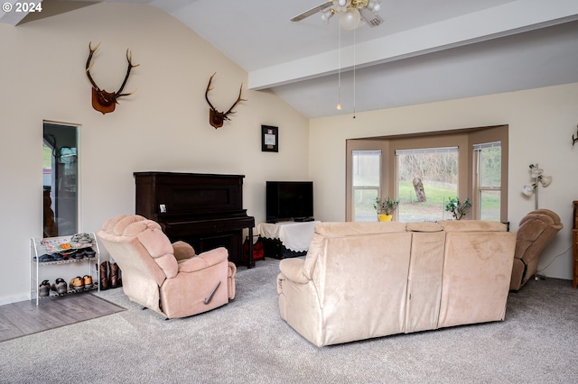 living room with carpet floors, lofted ceiling with beams, and ceiling fan