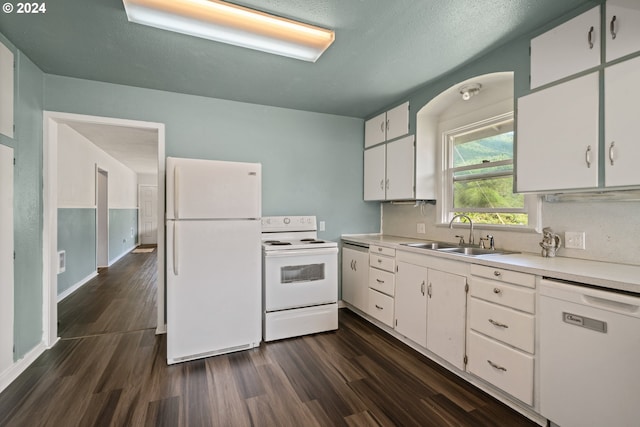 kitchen featuring white cabinetry, dark wood-type flooring, white appliances, a textured ceiling, and sink