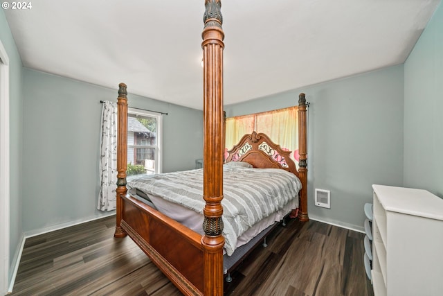 bedroom featuring dark hardwood / wood-style floors