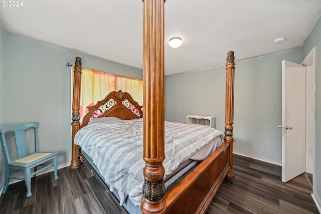 bedroom featuring dark hardwood / wood-style floors