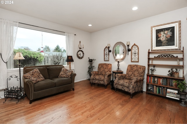 sitting room featuring hardwood / wood-style flooring