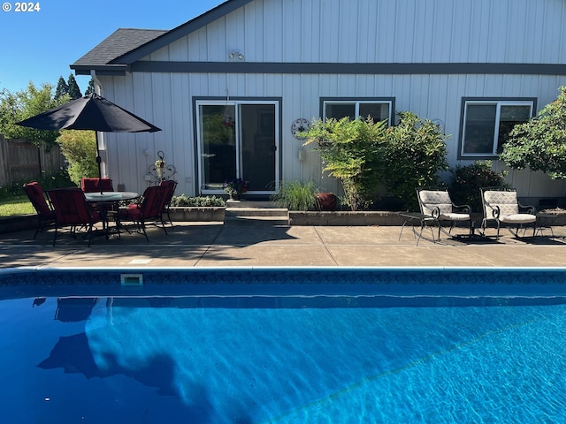 view of pool featuring a patio area