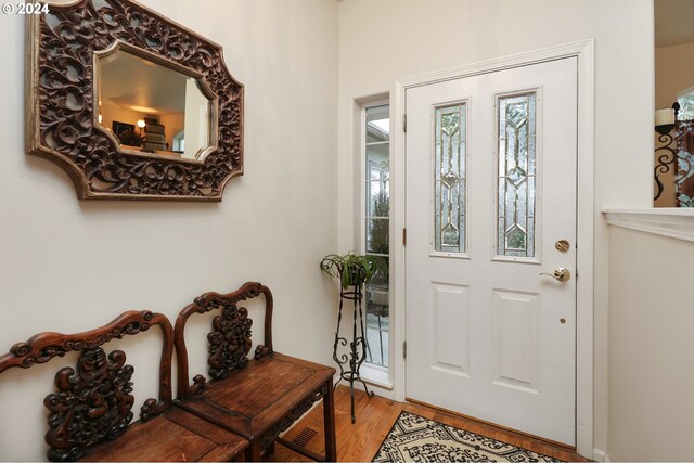 entryway with light hardwood / wood-style flooring