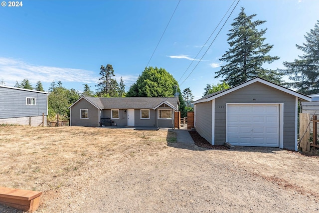 view of front of home with an outbuilding and a garage