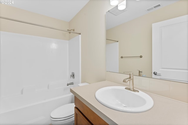 full bathroom with vanity, toilet, and bathing tub / shower combination