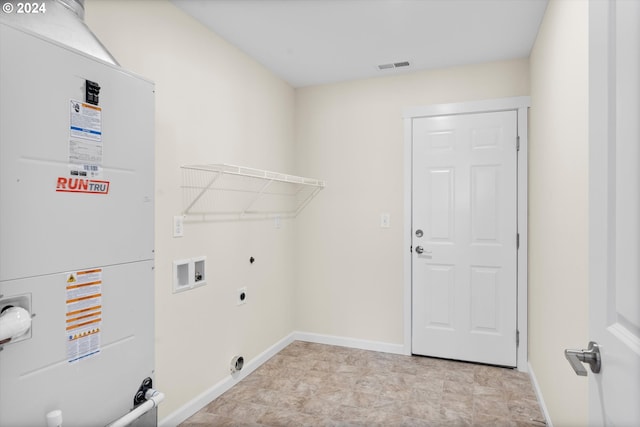 laundry room featuring washer hookup, electric dryer hookup, and heating unit