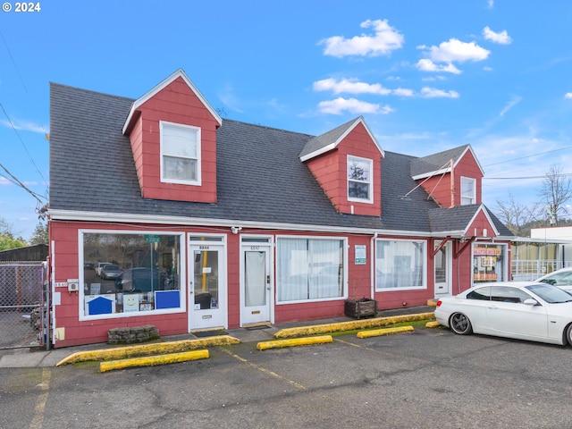 view of new england style home