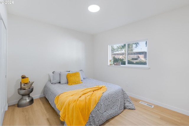 bedroom featuring hardwood / wood-style flooring