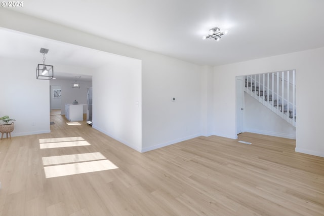 empty room featuring light hardwood / wood-style floors