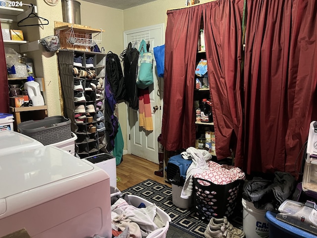 miscellaneous room featuring hardwood / wood-style flooring