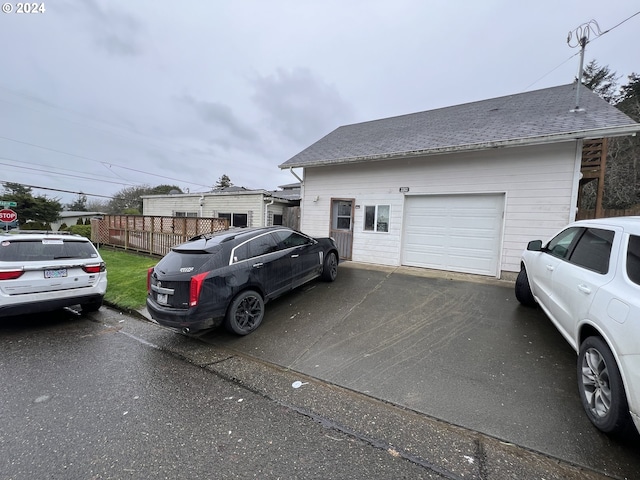 exterior space with a garage