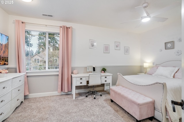 carpeted bedroom with ceiling fan