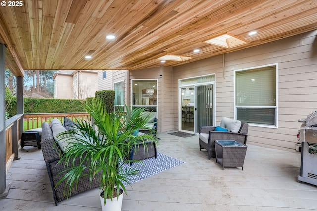 view of patio featuring outdoor lounge area and a deck