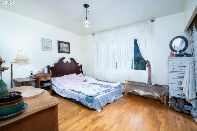 bedroom featuring wood-type flooring
