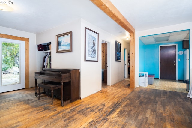 hallway featuring dark hardwood / wood-style flooring