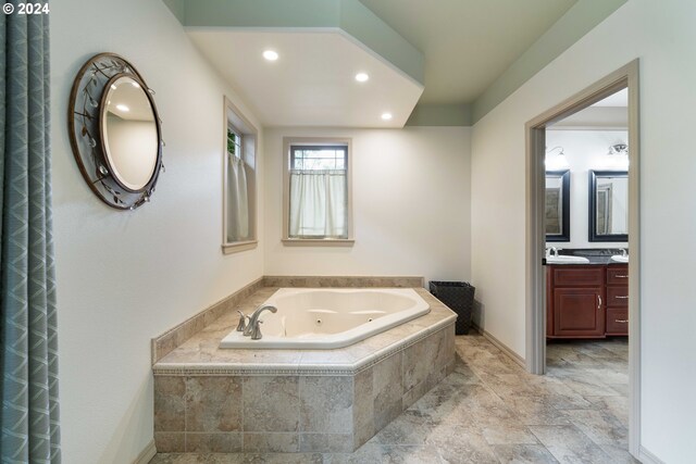 bathroom featuring vanity and an enclosed shower