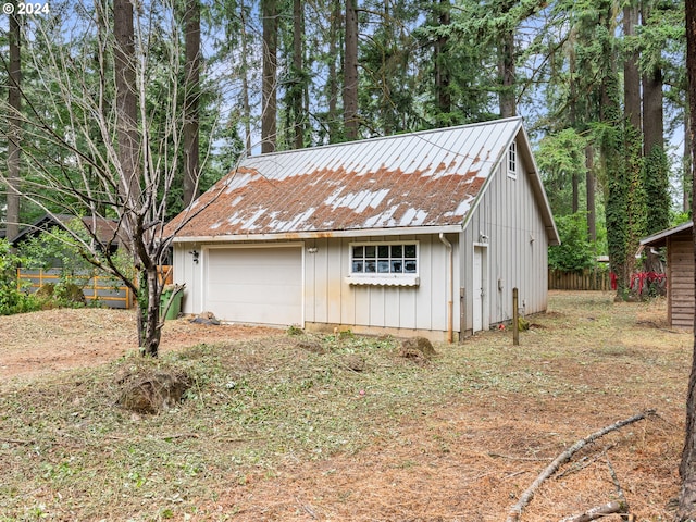 exterior space with a garage