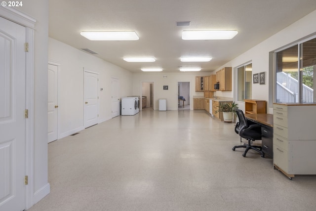 office featuring washer / dryer