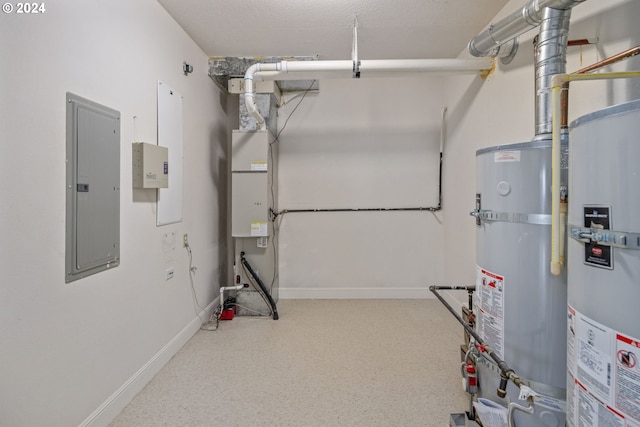 utility room featuring secured water heater and electric panel