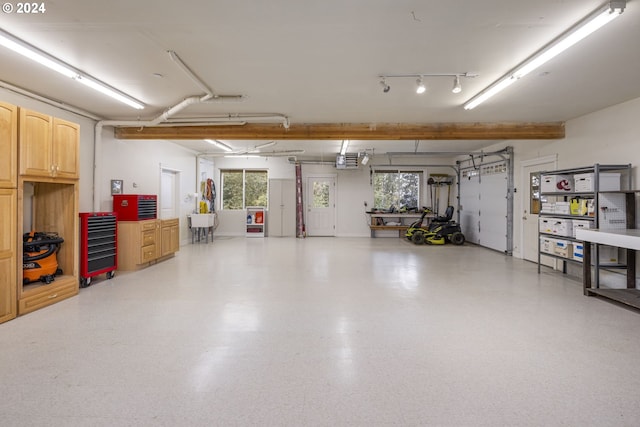 garage featuring a garage door opener