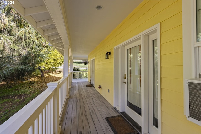 wooden deck featuring covered porch