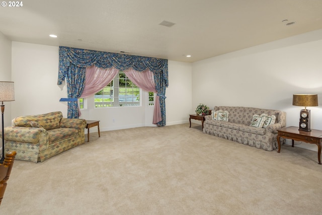 sitting room featuring carpet