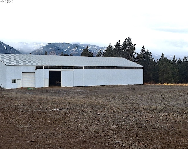 view of outdoor structure featuring a mountain view