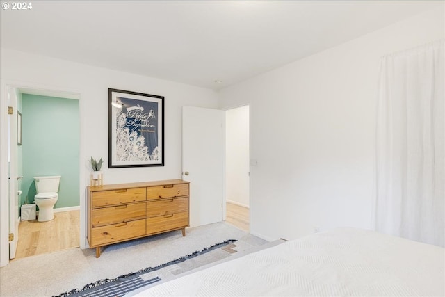 bedroom featuring ensuite bathroom