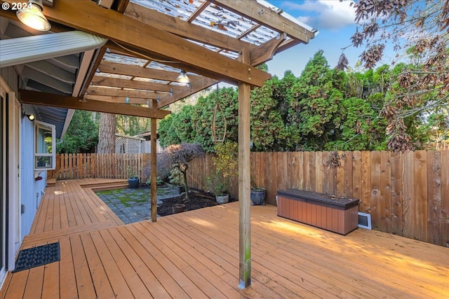 wooden deck featuring a pergola