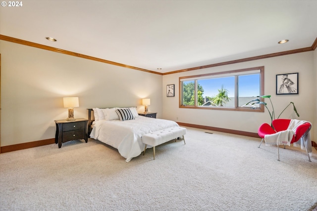 bedroom featuring carpet flooring and crown molding