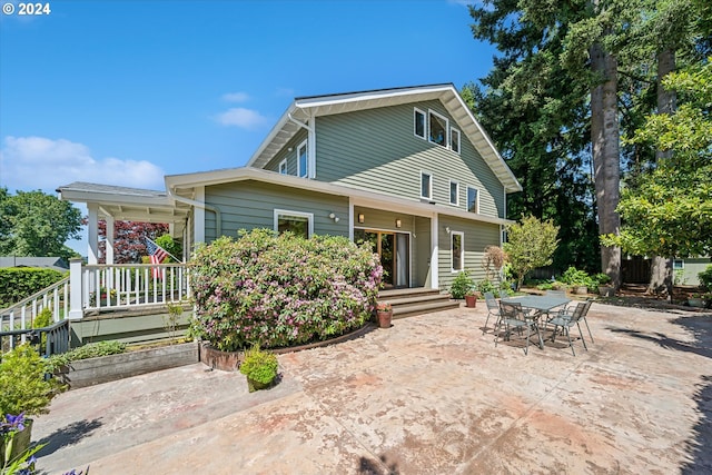 rear view of property with a patio