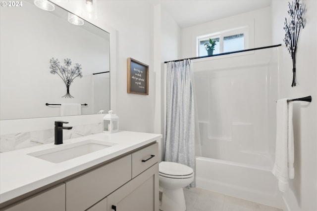 full bathroom with vanity, toilet, shower / bath combination with curtain, and tile patterned flooring