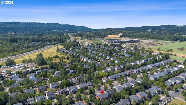 bird's eye view with a mountain view