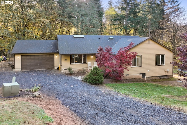 ranch-style home with a garage