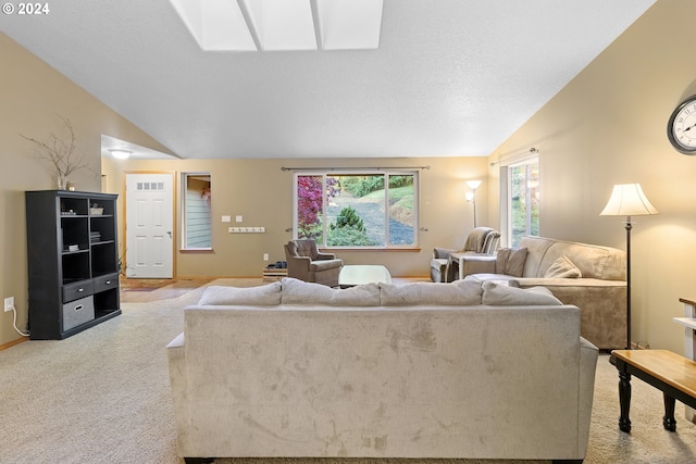 living room featuring light colored carpet and lofted ceiling