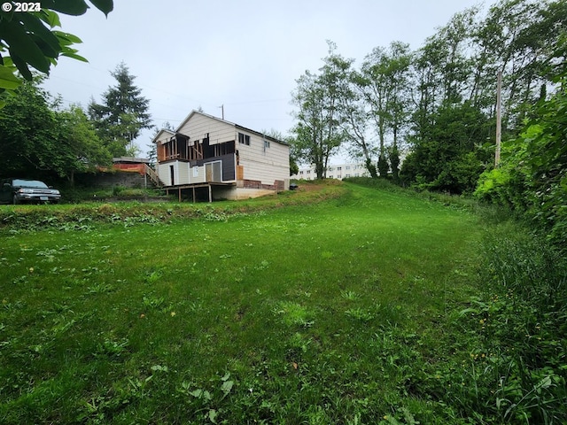 view of yard featuring a deck