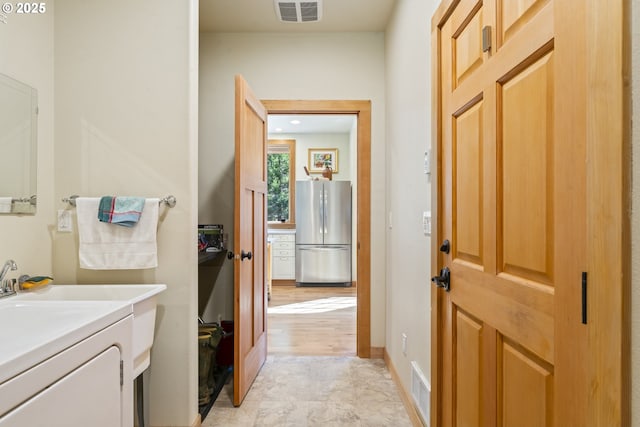 laundry room featuring visible vents, washer / clothes dryer, baseboards, and laundry area