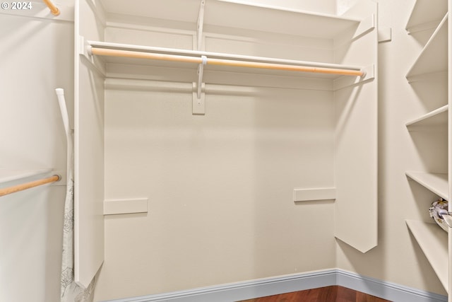 spacious closet featuring hardwood / wood-style floors